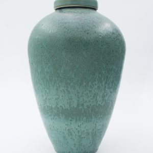 Urn floating green on blue